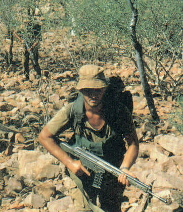 Scout trailing spoor in the Rhodesian bush.