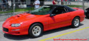 Heads and Cam '99 Hugger Orange SS with bogarts and denso iridium plugs at Beach bend raceway