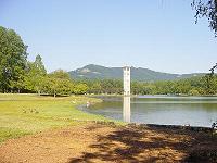 Tower, Lake, and Mountain