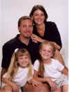 Stephen and Carolyn Crockett with their children Ashley (7) and Mariah (5).