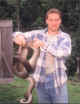 Some visitors aren't wanted.  Tim found this 13.5 foot python in his chicken coop.