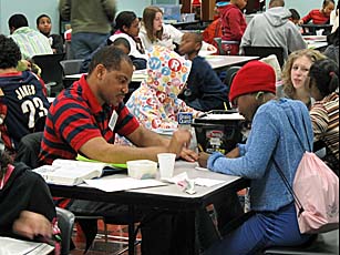 Corttrell Kinney tutors students in the Saturday Tutoring Program at the Church of the Covenant.