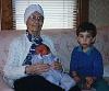 Grandma Horgen holding Jonah with Zach