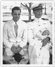 Three generations of John McCains - an infant McCain with his father and grandfather, both Navy Admirals