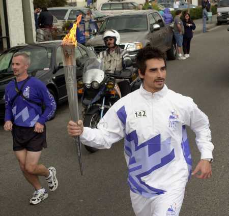 Kevin of the Backstreet Boys carrying the Olympic Torch in Los Angeles, CA on January 15, 2002.