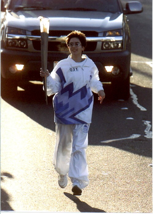 Me carrying the Olympic Torch in Sausalito, CA on January 19, 2002.