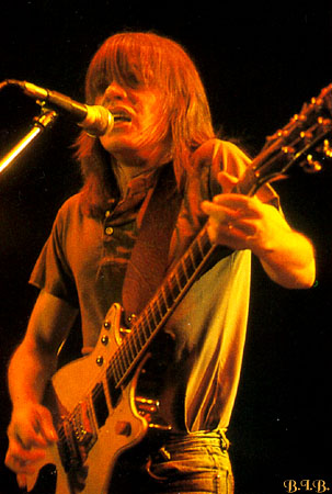 picture of malcolm playing guitar