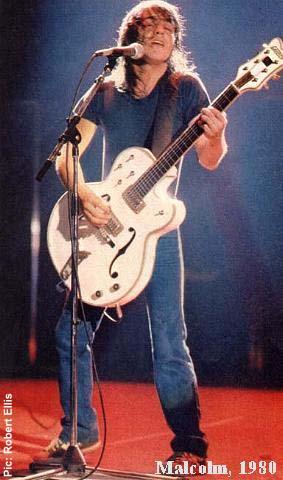 picture of malcolm playing guitar