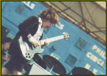 picture of angus playing guitar