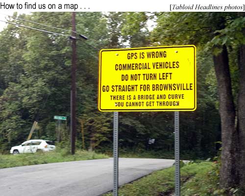 GPS is wrong: Commercial vehicles, do not turn left, go straight for Brownsville, there is a bridge and curve you cannot get through (Tabloid Headlines photos); you'll need an actual map, MapQuest and Yahoo! won't work either