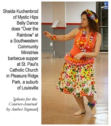 Shaida Kuchenbrod, of Mystic Hips Belly Dance, does 'Over the Rainbow' at a Southwest Community Ministries barbecue supper at St. Paul's Catholic Church in Pleasure Ridge Park, a suburb of Louisville (photo for the Courier-Journal by Amber Sigman)