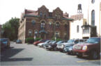 Gun Hill Road at Holland Ave: Capuchin Monastery behind Immaculate Conception Church
