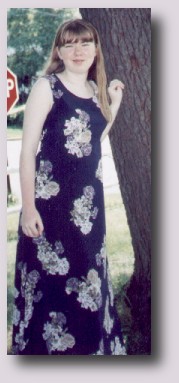 Me in a dress and make-up. O_O; 
And my hair's so short there!