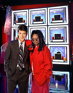 Tom Bergeron and Whoopi Goldberg on the set of HOLLYWOOD SQUARES, 1998