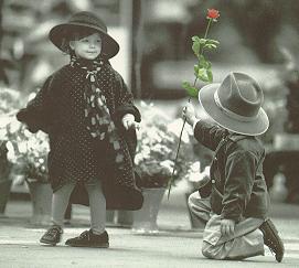 GIRL AND BOY WITH ROSE