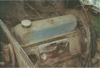 '55 view under the bonnet (hood) - what a bloody mess !.