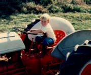 Having fun pretending to drive the 9N Ford farm tractor