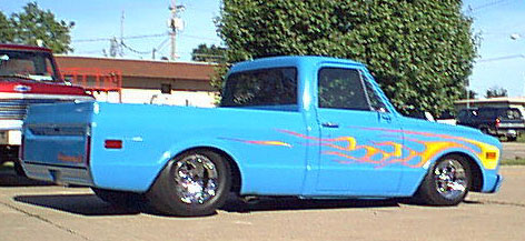 This Chevy Shortbed has been slammed, tubbed and flamed