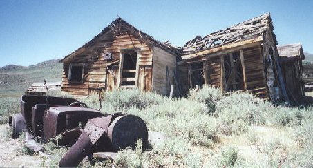 Ruins of a car and home at Bodie Ghost Town