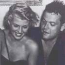 candid shot of Orson and Rita