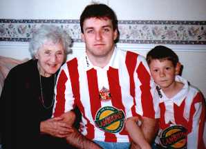 My gran aged 88 who still supports SAFC, me, my son Adam both of us bedecked suitably as you'd expect.....