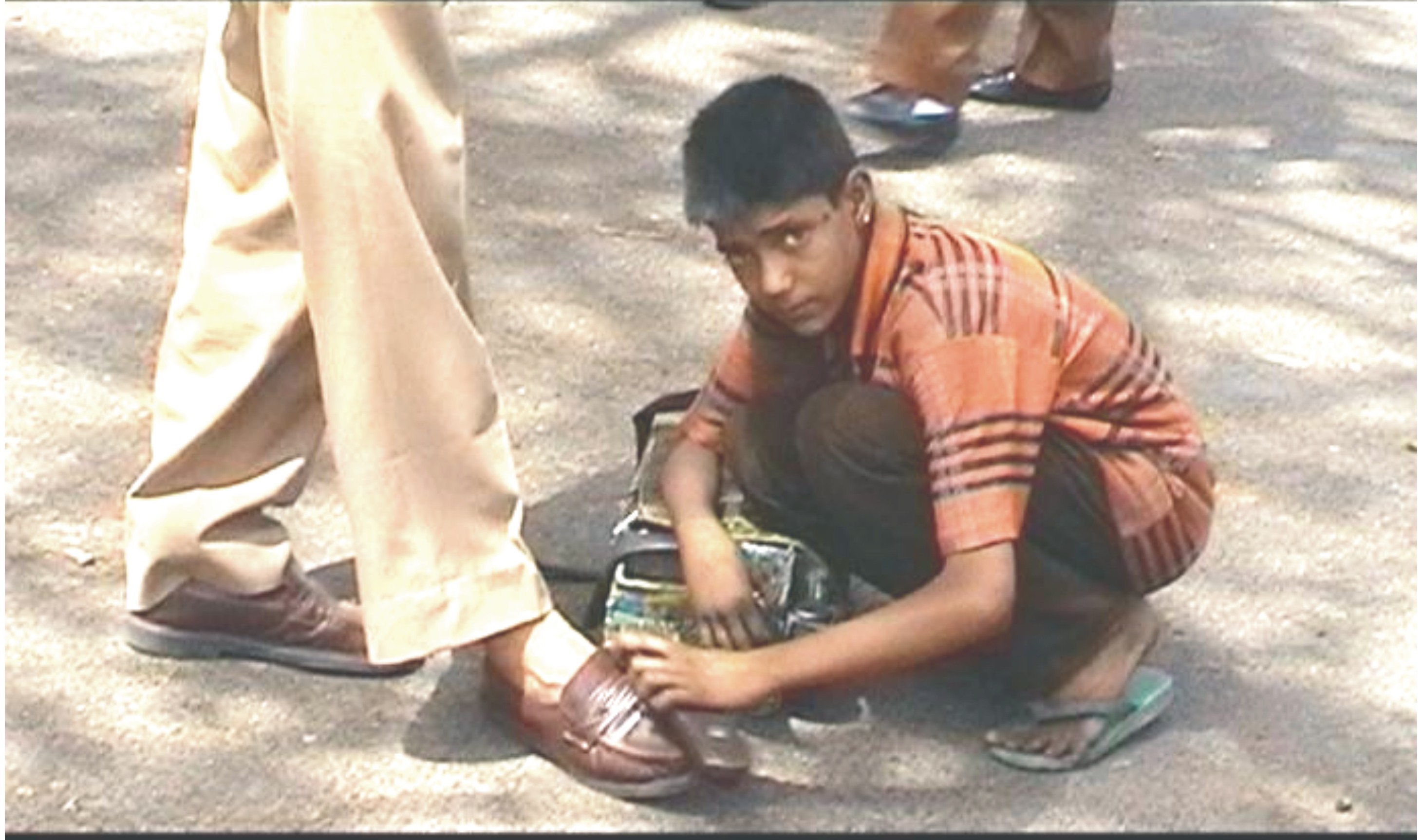 childlabour with profession of shoe polish
